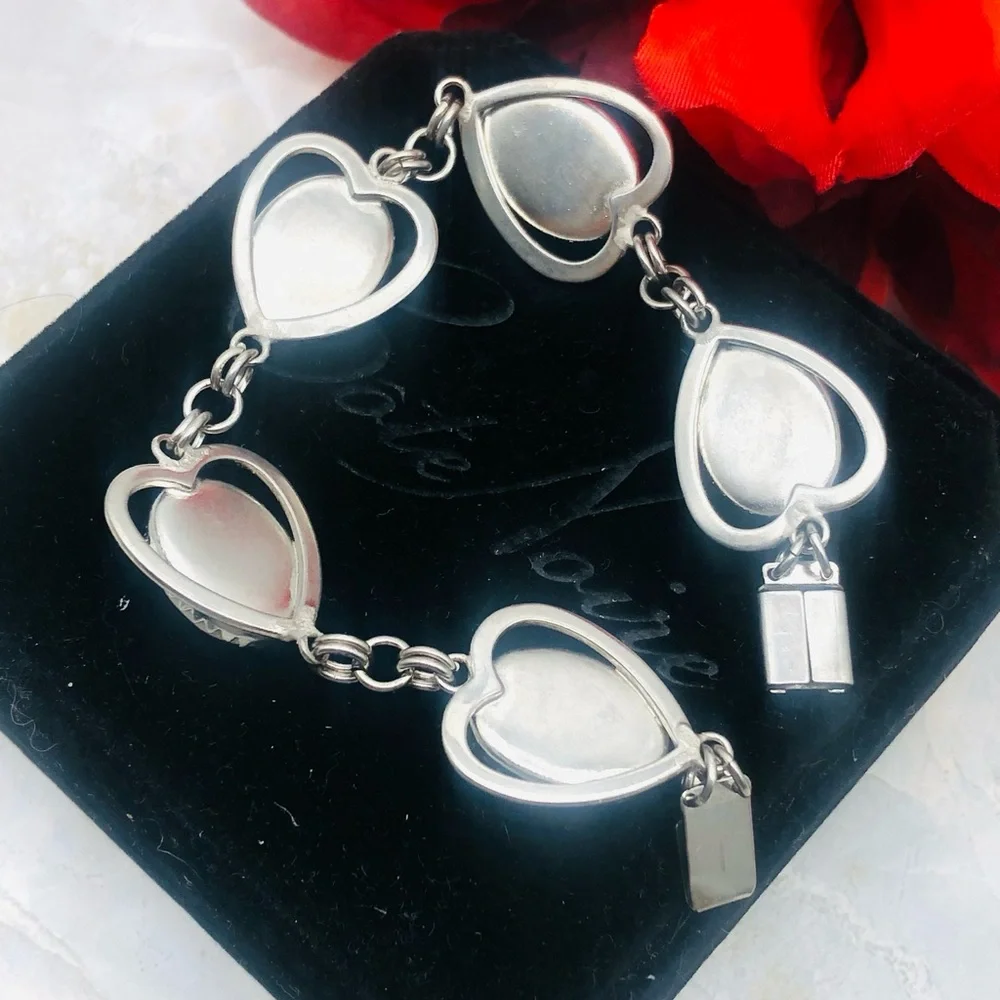 Rhodium Plated Bracelet with Pale Green Amber Cabochons